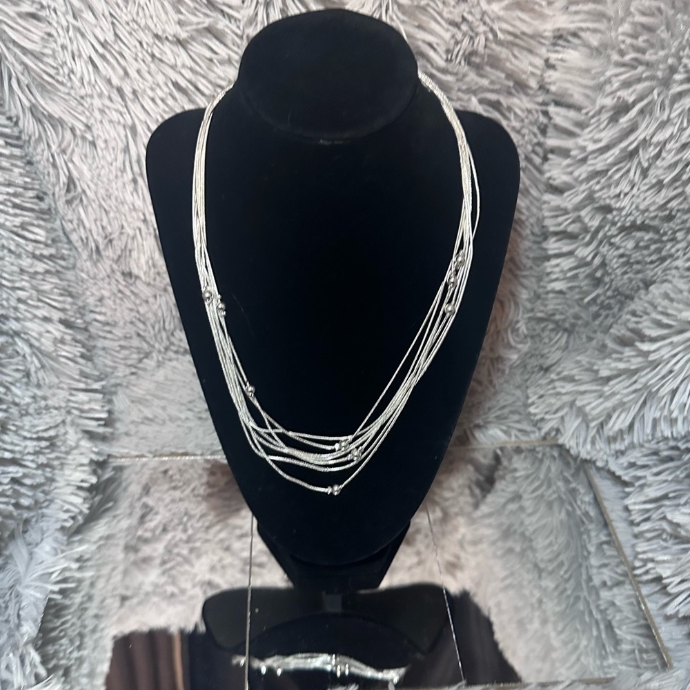 Multi strand silver necklace